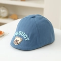 Detail of light blue cotton baby beret featuring bear patch and PROUCT 3D embroidery - 50cm (1-3 Years) / Blue