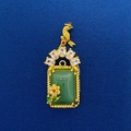 Vintage green jade pendant with gold bird and floral details on blue background - Retro Flower Bird Green Jade Style (722)