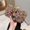 Sparkling gold evening clutch bag with multi-color rhinestones and elegant chain strap - Colorful