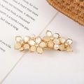 Detail of gold floral hair clip with opal stones, shiny rhinestones and pearls - Style 3 Large Four Flowers