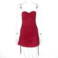 Detail of red strapless mini dress featuring ruching textures and side drawstrings - S / Red