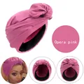 Details des operapinken Turbans mit Satinfutter und geknotetem Design-Element - Rosé