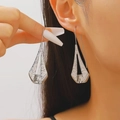 Silver geometric hollow triangle earrings with hammer texture finish on long ear hooks - Hollow Hammered Long Triangle Style (7585) / 59 White K