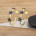 Boucles d'oreilles créoles dorées 18 carats avec cristaux violets, bleus et verts - Pentagramme / Or/Zircone Multicolore