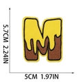 Detail view of letter M bee embroidery patch with dimensions 5.7cm x 5cm on white background - Letter M Style (XT287)