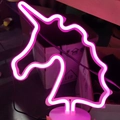 Pink unicorn LED neon light on a white base with a USB cable for night decor - Pink Unicorn