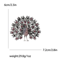 Elegant peacock brooch in silver finish with vibrant red and black sparkling rhinestones - Purple