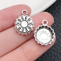 Silver vintage beer cap charms for DIY jewelry making with star and lettering - Antique Silver Beer Bottle Cap (14x17mm)