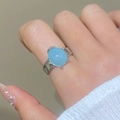 Bague boho argentée avec une grande pierre ovale bleu clair sertie à quatre griffes - Gemme Ovale Seule Style B (7417)