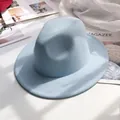 Detail of light blue wool fedora hat with a flat wide brim on a lifestyle background - M (56-58cm) / Sky Blue