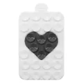 Detail of double-sided heart silicone suction cup phone holder with dual-color design - White + Grey