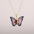 Detailed close-up of acrylic butterfly pendant with gold foil and zircon embellishments - Gold Chain-Fantasy Purple