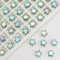 Macro shot of 8mm star-shaped AB crystal glass beads for DIY jewelry and hair accessories - Transparent Green
