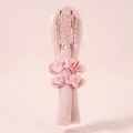 Close-up of pink satin heatless hair curler set with matching scrunchies and large hair claw - Rubber Stick Pink (1 Curler + 2 Scrunchies + 1 Clip)