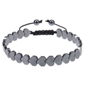 Detail of heart-shaped hematite beads on a black braided adjustable cord bracelet - Smooth Heart Style (Peach Heart Black Magnetic Bracelet)