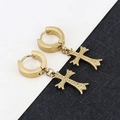 Detail of gold cross pendant earrings with polished texture on dual-tone background - Cross - Gold