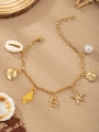 Golden ocean theme bracelet featuring starfish, seashell, pearl, and letter G charms - Letter G(G)
