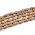 Macro detail of shuttle-shaped natural agate beads with golden crystal textures and pores - Seed Beads / 12 Pieces/Strand (8*16mm) / Electroplated Burgundy