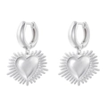 Macro view of silver heart earrings with radial textures and polished metal finish - VE1443 Silver