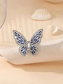 Anello farfalla scintillante con gemme blu rettangolari e finitura argento - Anello / Blu + Argento