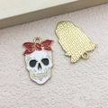 Skull pendant with white enamel finish and red bow detail for DIY jewelry making - Bowknot Skull