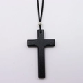 Close-up of black wooden cross pendant with textured finish and silver hollow metal bead - Black Single Layer Cross