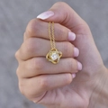 Elegant gold knot pendant necklace with a round centerpiece stone and zircon accents - Four-leaf Clover Gold Color (762)