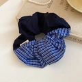 Detail of handmade dual-tone scrunchie with navy blue fabric and blue-white check pattern - Blue Spliced Plaid Style