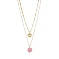 Detail view of double-layered 18K gold-plated necklace with pink enamel heart and moon pendant - Pink