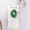 Green dinosaur number 0 birthday candle with polka dots and spikes for kids party - Number 0