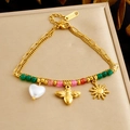 Pulsera de cuentas de acero dorado con dijes de corazón perla abeja y sol - Estilo de Colgante de Múltiples Elementos (B1992)