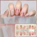 Detail of semi-cured gel nail stickers with pink lotus flowers and glitter flakes - CS414