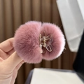 Pink plush double pom-pom hair claw clip with clear plastic frame and soft fur texture - Bean Paste Purple