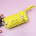 Bright yellow pencil case with astronaut boy print and portable handle strap - Space Boy (Yellow)