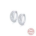 Orecchini a cerchio in argento 925 con motivo a stella e zirconi brillanti incastonati - Argento