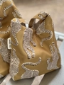 Detailed close-up of yellow canvas tote bag featuring black and white tiger pattern - Small Handheld Underarm Bag