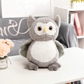 Cute grey and white owl plush toy with green polka dot wings on a desk - 25cm / Light Gray