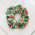 Detail of Christmas scrunchie with snowflake prints on soft green velvet fabric - Green Snowflake