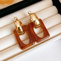Golden geometric earrings with tortoiseshell resin pendants in a velvet box - Brown
