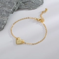 Bracelet coeur doré élégant avec breloque lettre T gravée et chaîne réglable - Lettre T