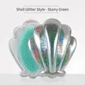 Shell shaped detangling hair brush with glitter star green finish and sleek design - Shell Glitter / Starry Sky Green