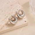 Boucles d'oreilles gouttes d'eau épaisses en argent poli de style minimaliste chic - EH027/Goutte d'Eau Creuse Acier