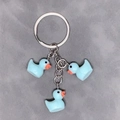 Cute light blue resin duck pendant keychain with silver metal rings for backpacks - 3-Piece Set / Blue