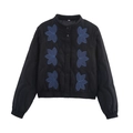 Detail of blue floral embroidery on black quilted cotton jacket with snap buttons - S / Black