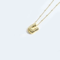 Vintage style gold necklace with a U-shaped letter pendant paved in zircon stones - Style U