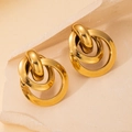 Detail shot of golden interlocking triple-ring earrings with high-polished metal finish - Gold Multi-Hoop Interlock Polished (BJGE0732)