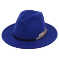 Detail of royal blue wool fedora hat featuring a gold leaf metal accessory on the band - Sapphire Blue