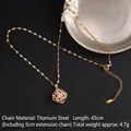 Gold titanium spinning clover necklace with pink gemstone and zircon flower pendant - Pink Gemstone Flower Style (A851)