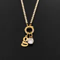 Stainless steel 14K gold plated necklace with letter g charm and rhinestone pendant - Letter G (XNL0103)