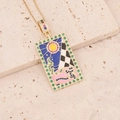 Detalle de colgante de tarot en oro 18K con sol de esmalte y borde de circonitas - Estilo Sol y Olas de Mar (1#)